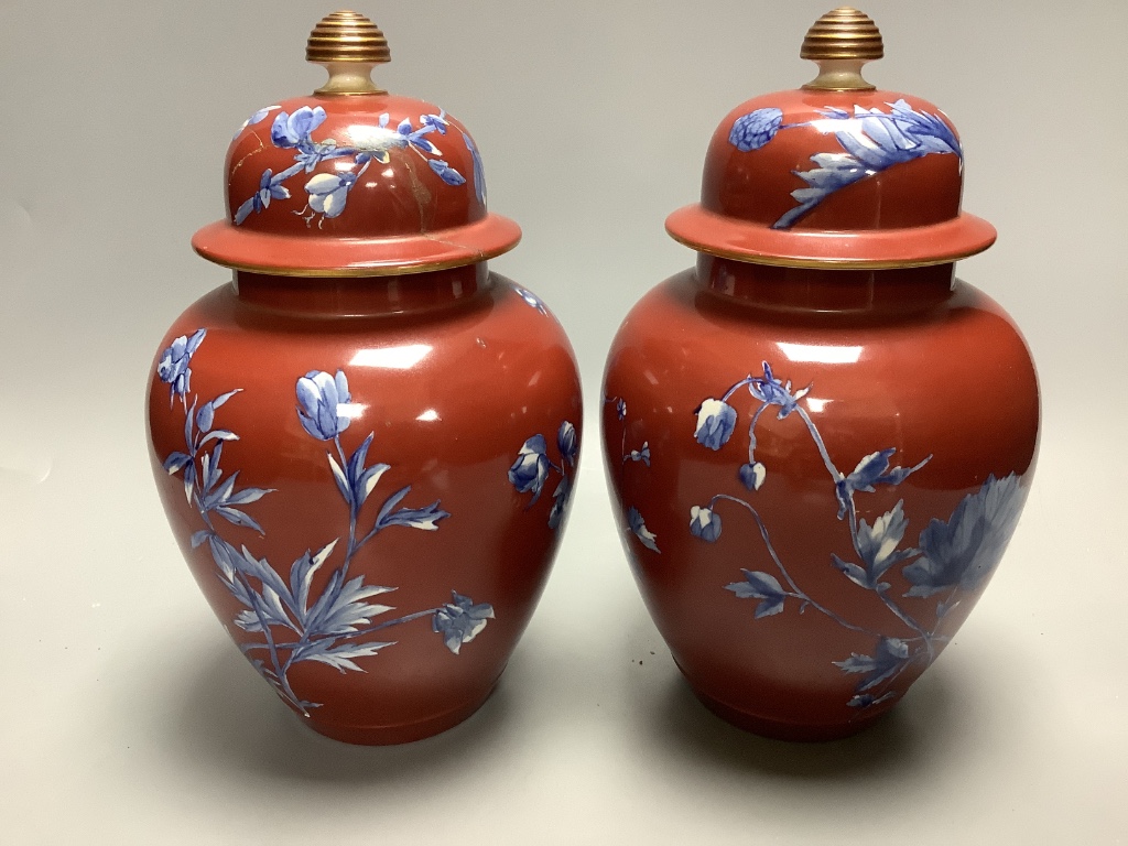 A pair of Victorian Wedgwood vases and covers 25cm